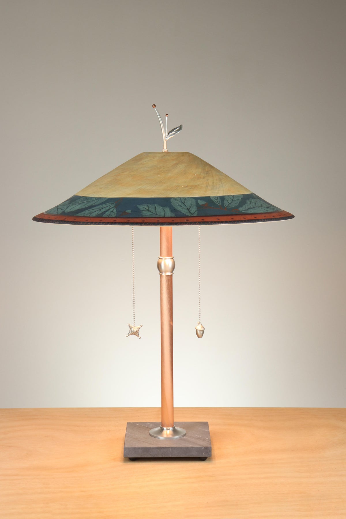 Janna Ugone &amp; Co Table Lamps Copper Table Lamp with Large Wide Conical Ceramic Shade in Oak Border in Indigo &amp; Amber