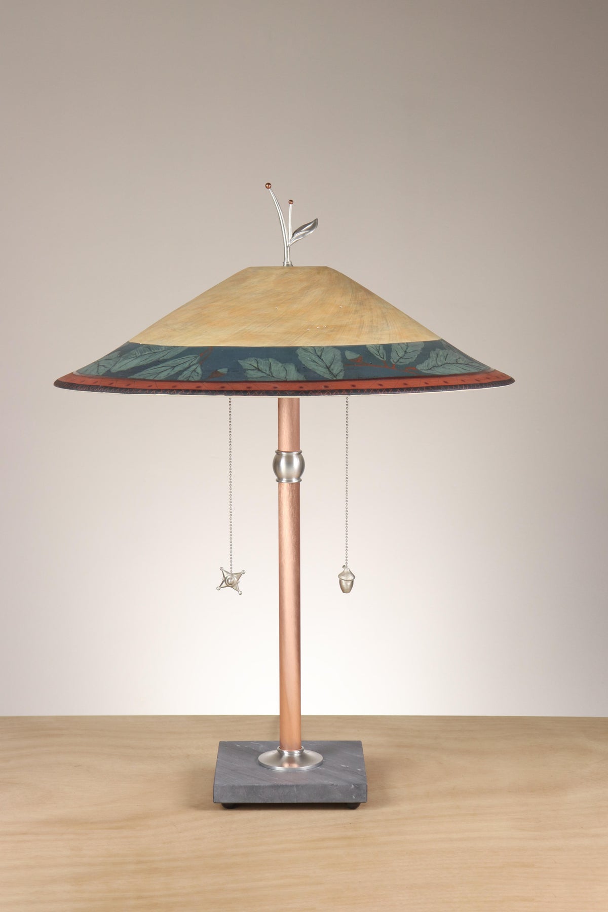 Janna Ugone &amp; Co Table Lamps Copper Table Lamp with Large Wide Conical Ceramic Shade in Oak Border in Indigo &amp; Amber