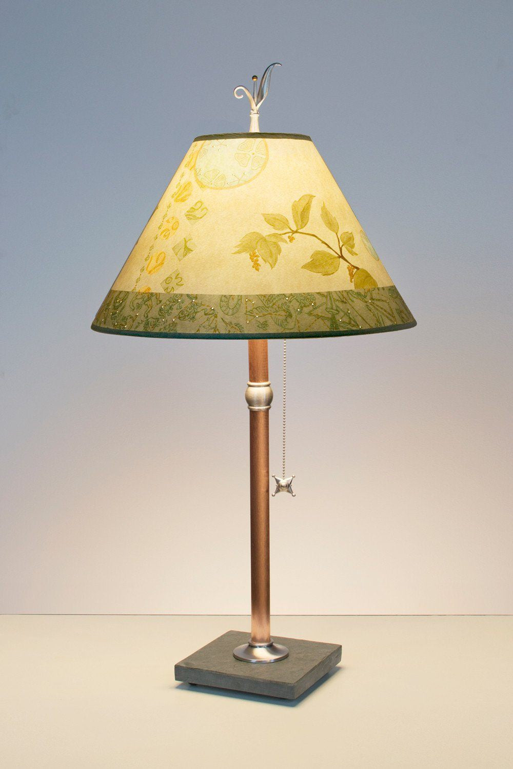 Celestial Leaf medium conical copper table lamp lit