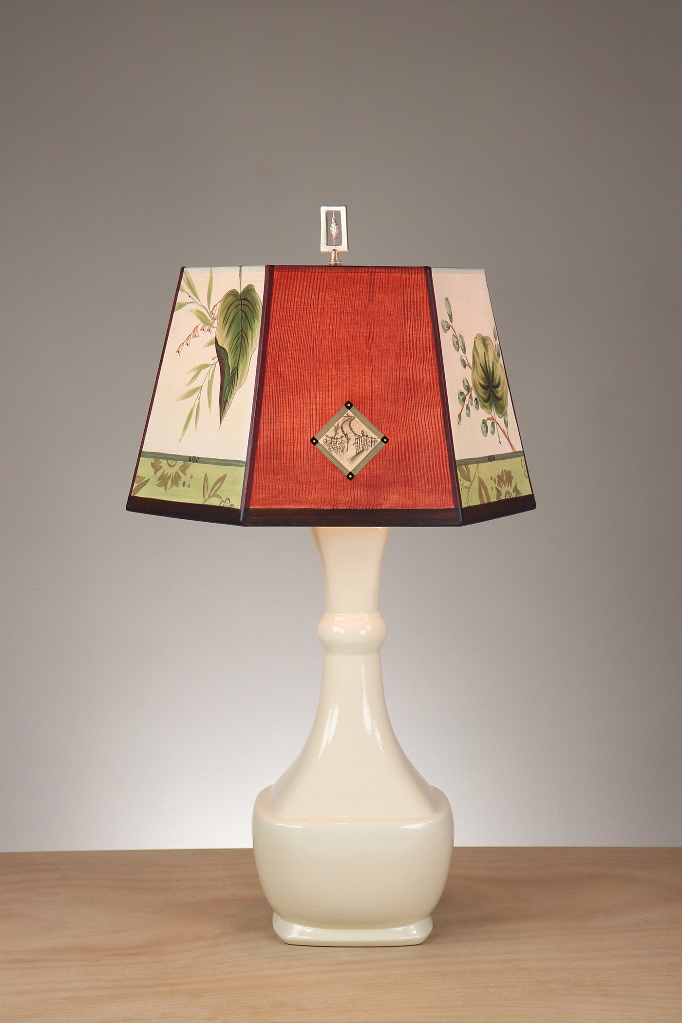 Janna Ugone & Co Ivory Ceramic Table Lamp with Medium Hexagonal Shade in Leaf Portrait Gate in Redwood